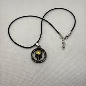 NWOT Framed skull pendant and wax cord